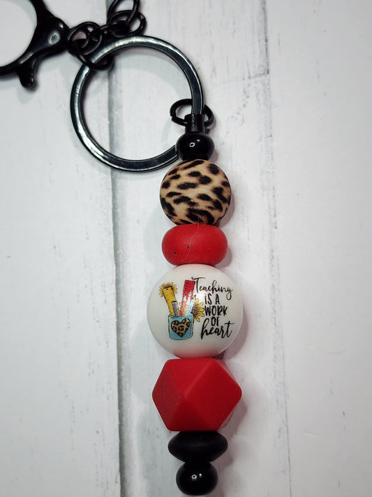 Red teaching is a work of heart keychain