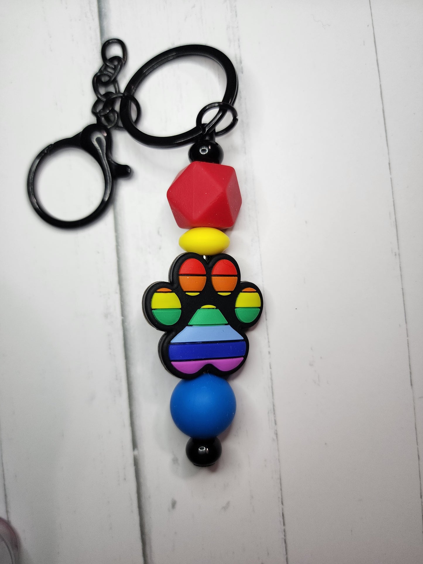 Rainbow paw print (red,yellow,blue) keychain